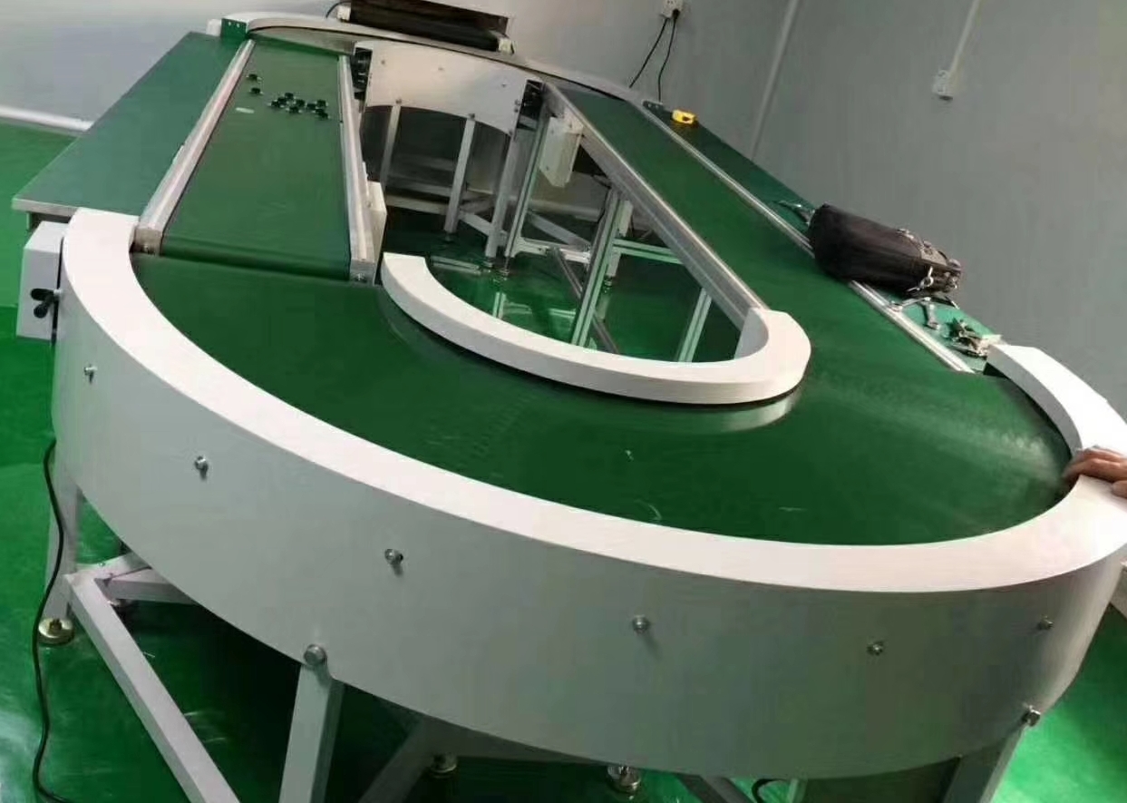 轉(zhuǎn)彎帶式輸送生產(chǎn)線.jpg 轉(zhuǎn)彎帶式輸送生產(chǎn)線.jpg